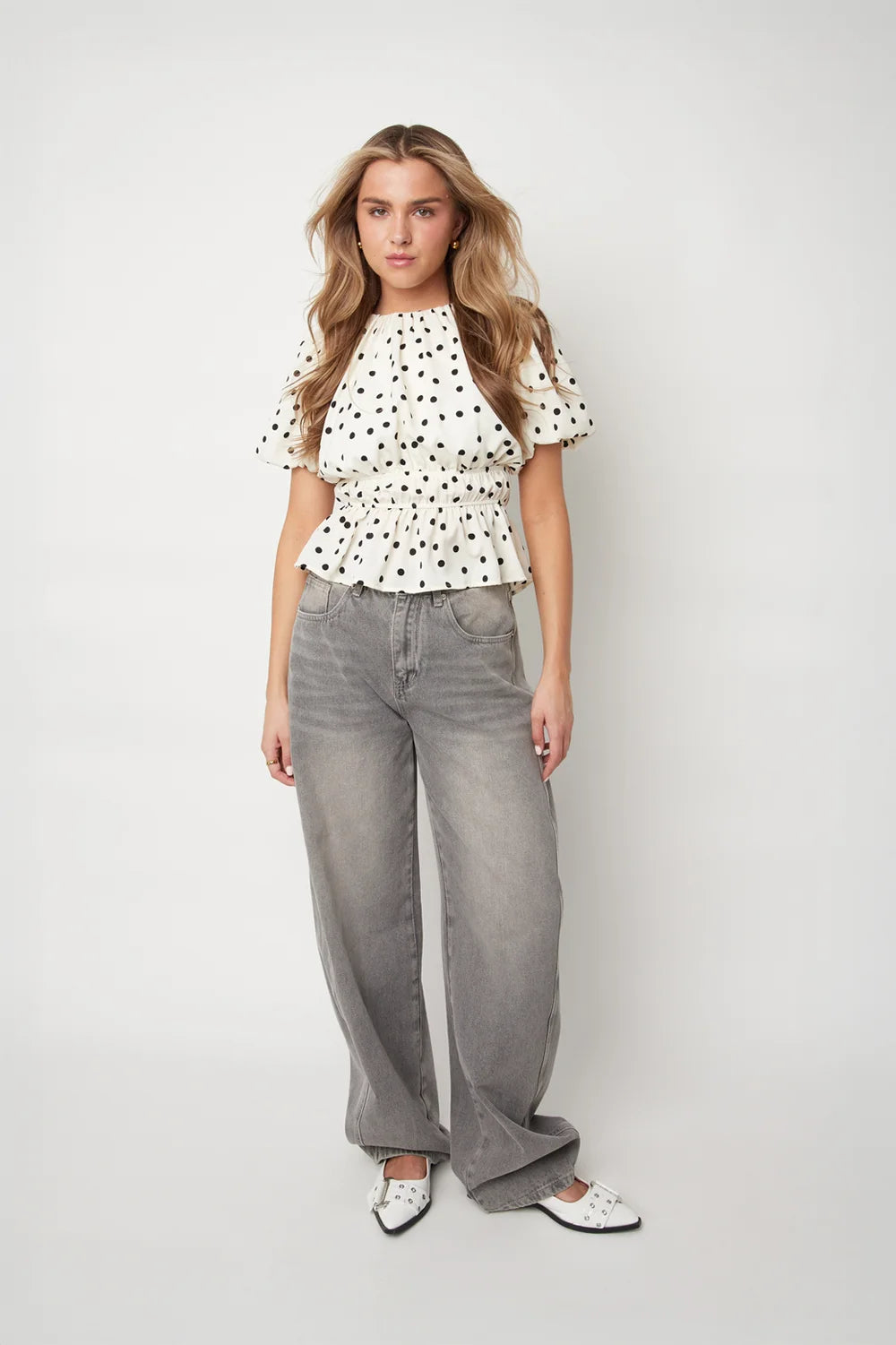 Peplum top met stippen