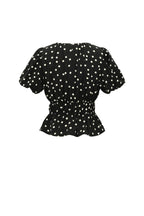 Peplum top met stippen